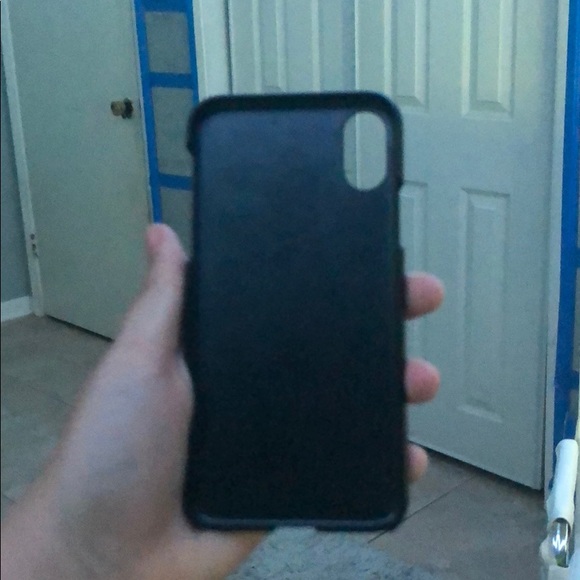 This is a IPhone X black flimsy but durable case - Picture 2 of 3